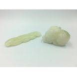 2 Chinese carved white jade, 1 mystical beast & fungi leaf (2)