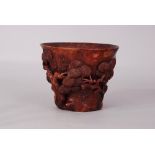 Chinese bamboo libation cup carved and pierced as a gnarled pine trunk with foliate branches, 11.2cm