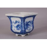 C20th Chinese blue and white square jardiniere painted to each side with a panel of mountainous