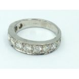 18ct White gold diamond rub over setting, half eternity ring of 1.25cts approx, size M