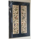Pair of Chinese embroidered sleeve bands 47cm L, mounted but unframed