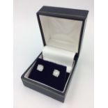 Pair of 18ct white gold substantial diamond ear studs of 3.2cts