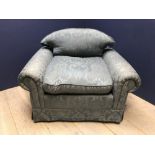 Very large blue upholstered arm chair
