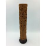 Incense holder in slender cylindrical form