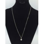 18ct white gold diamond pendant necklace of 1.2cts approx, on a gold chain
