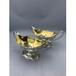 Pair George III silver bats wing salts crested with loop handles conforming foot by Robert and