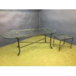 A large glass dining table with wrought iron base, 213cmL; & a smaller, similar coffee table