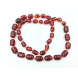 String of cherry amber beads