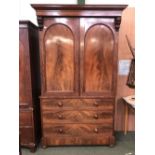 Early Victorian flame mahogany linen press,with 2 doors opening to reveal slides above 3 drawers 226