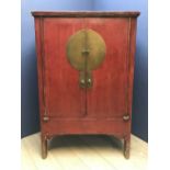 A Red lacquered Chinese cabinet with fitted shelves & drawers 176cm