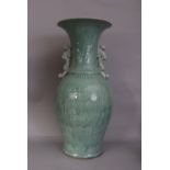 Large C18th Chinese celadon baluster vase, flanked by a pair of dragon handles, moulded around the