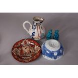 Chinese famille rose jug painted with figures; together with a blue and white 'landscape' bowl, a