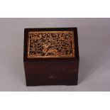 Chinese ivory-inset wood box, the ivory panel carved with qilin, Ming dynasty.