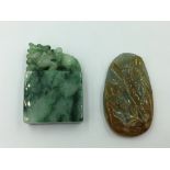 Chinese carved jade pebble with bird on a branch, Jade block surmounted by a dragon (2)