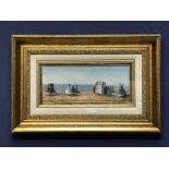 Gilt framed & glazed oil painting of 'Extensive Victorian Beach Scene with figures beside Changing
