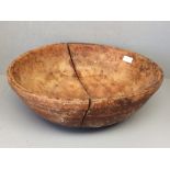 Large C19th treen butter bowl 40.5 cm (badly cracked)