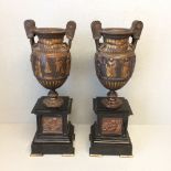 Pair of bronze urns 38.5 cm decorated with classical figures