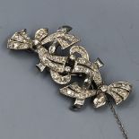 Platinum & diamond two part clip brooch, collet & claw throughout with old brilliant cut diamonds