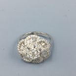 18ct White gold flower shaped diamond ring approx 1.2cts size M