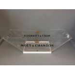 Perspex champagne container marked Moet & Chandon, 10 bottles