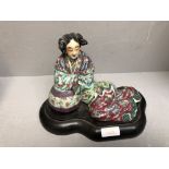 Chinese figure of a reclining lady on wooden stand, original a lamp base 25 x 19 cm