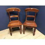 Pair of stained pine chairs