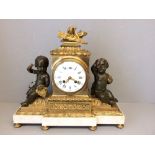 French bronze & Ormolu clock surmounted on either side by cherubs 36 h x 40 w cm