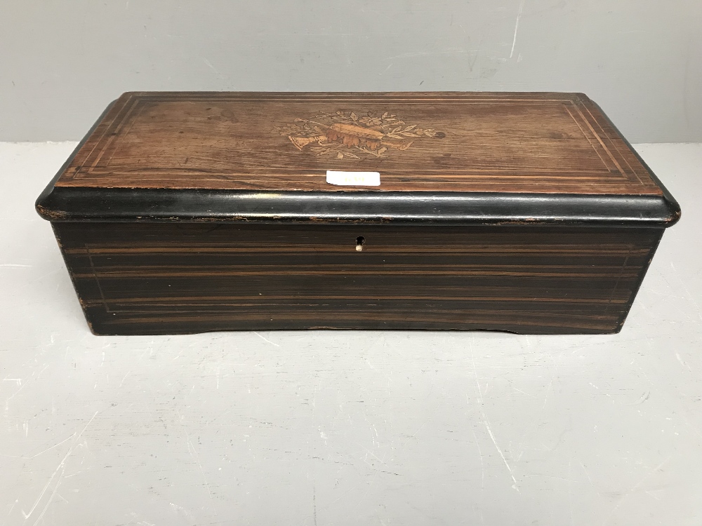 An 10 tune Swiss musical box in mahogany case 49 x 27 cm