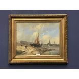 Gilt framed oil painting 'Coastal Scene with Fishing Boats & figures on Shoreline' 29.5 x 38 cm