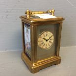 Miniature carriage clock with decorated porcelain panels 6 cm h