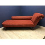Red upholstered chaise longue