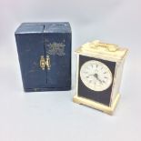 Travelling cased miniature clock