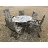 Circular hardwood garden table 110 cm dia, 5 chairs including 2 carvers