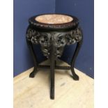 Hard wood carved Chinese stand in set with marble on its circular top 38 d 61 h cm
