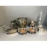 Silver plated pair of coasters, wine bottle holder, bottle cradle, ice bucket, decanter etc