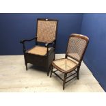 Oak framed armchair, with bergere back and seat, opening to reveal a white china commode with lid,