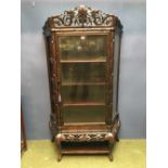 3 Shelf glazed hardwood Chinese cabinet decorated with elaborate carving on a hard wood stand 98 w