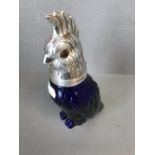 Blue glass & white metal parrot claret jug