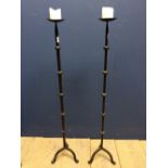 Pair of tall iron candle sticks 113 cm tall
