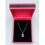 18ct White gold emerald & diamond pendant necklace on gold chain approx 40 points