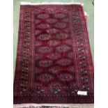 Bokahara silk & wool rug in deep red with geometric pattern 200 x 128 cm