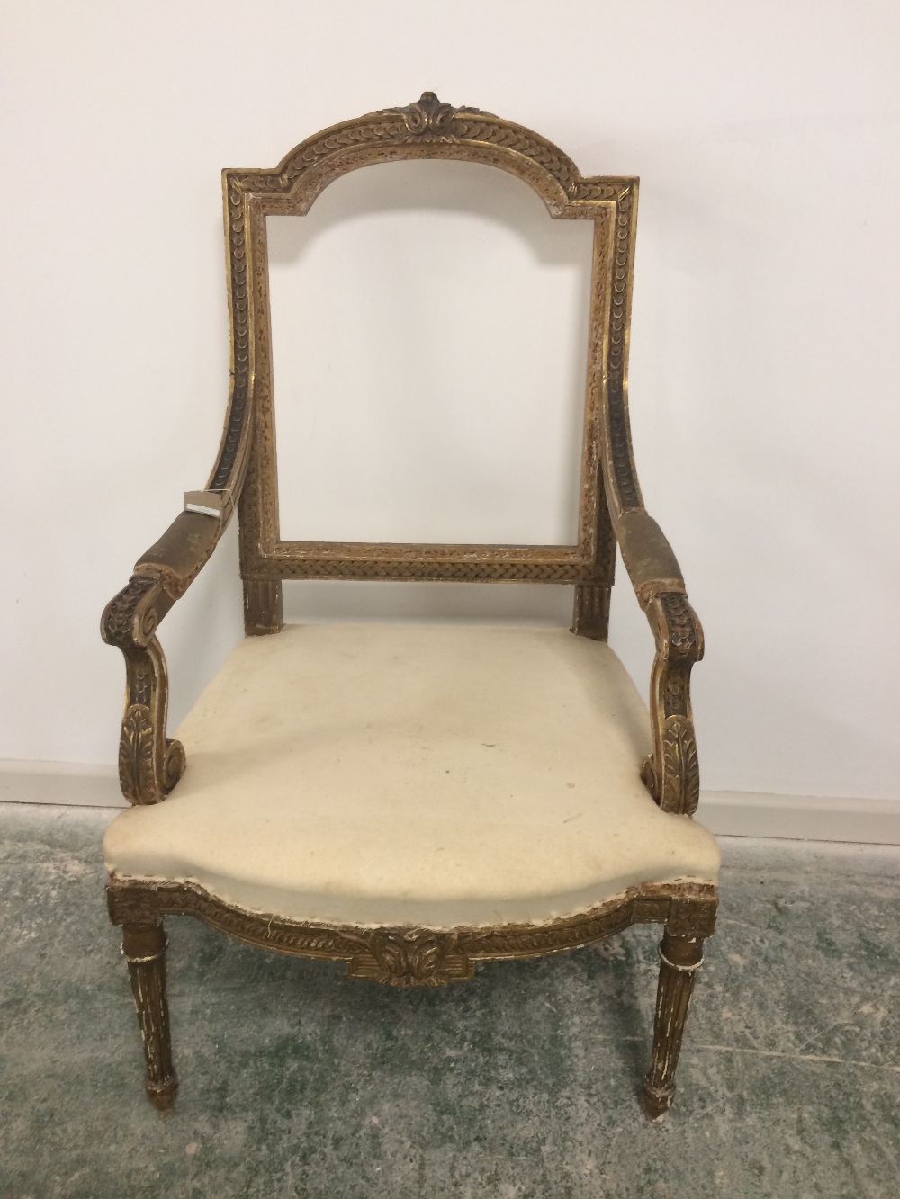 French parcel gilt elbow chair (back missing)