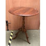 Edwardian round wine occasional table with carved legs