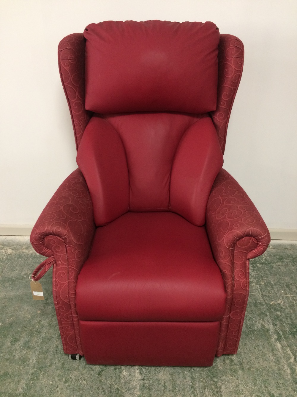 Modern 'Repose electric recliner chair' with manufacturers labels