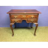 Oak lowboy with 1 long drawer over 2 small side drawers 86 x 53 cm