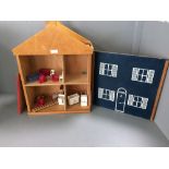 Modern wooden dolls house with assorted furniture