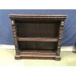 Heavily carved Black Forest style C19th four shelf book case