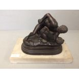 Late C20th bronze of wrestlers on a white marble base 20cm