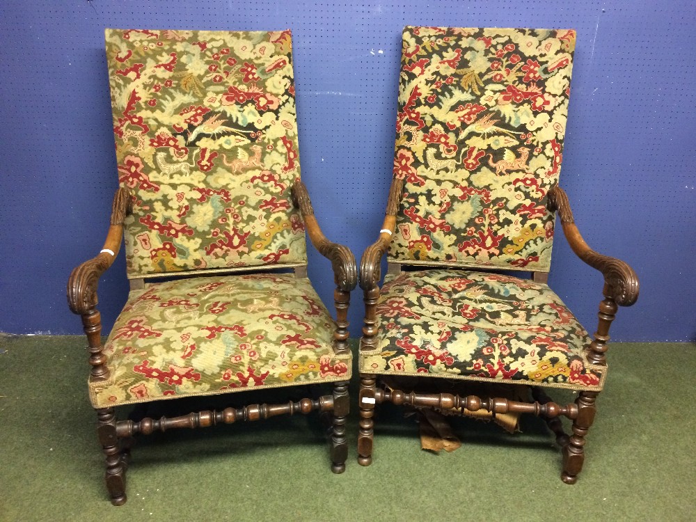 Pair of tapestry covered Louis XIV style chairs with carved oak arms