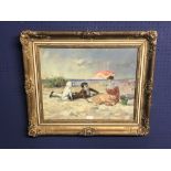 Gilt framed oil painting with 'Figures & Dog on Beach' 40 x 49.5 cm